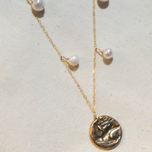 SPARROW IN PEARLS NECKLACE